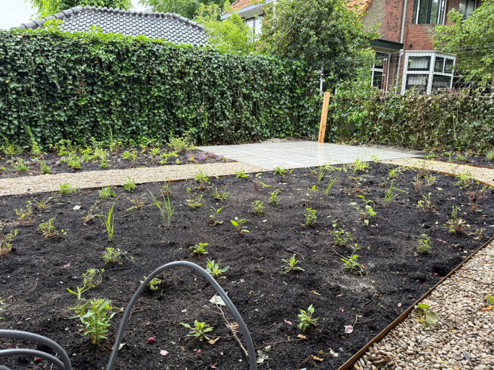 Beplantingsplan met cortenstaal paden